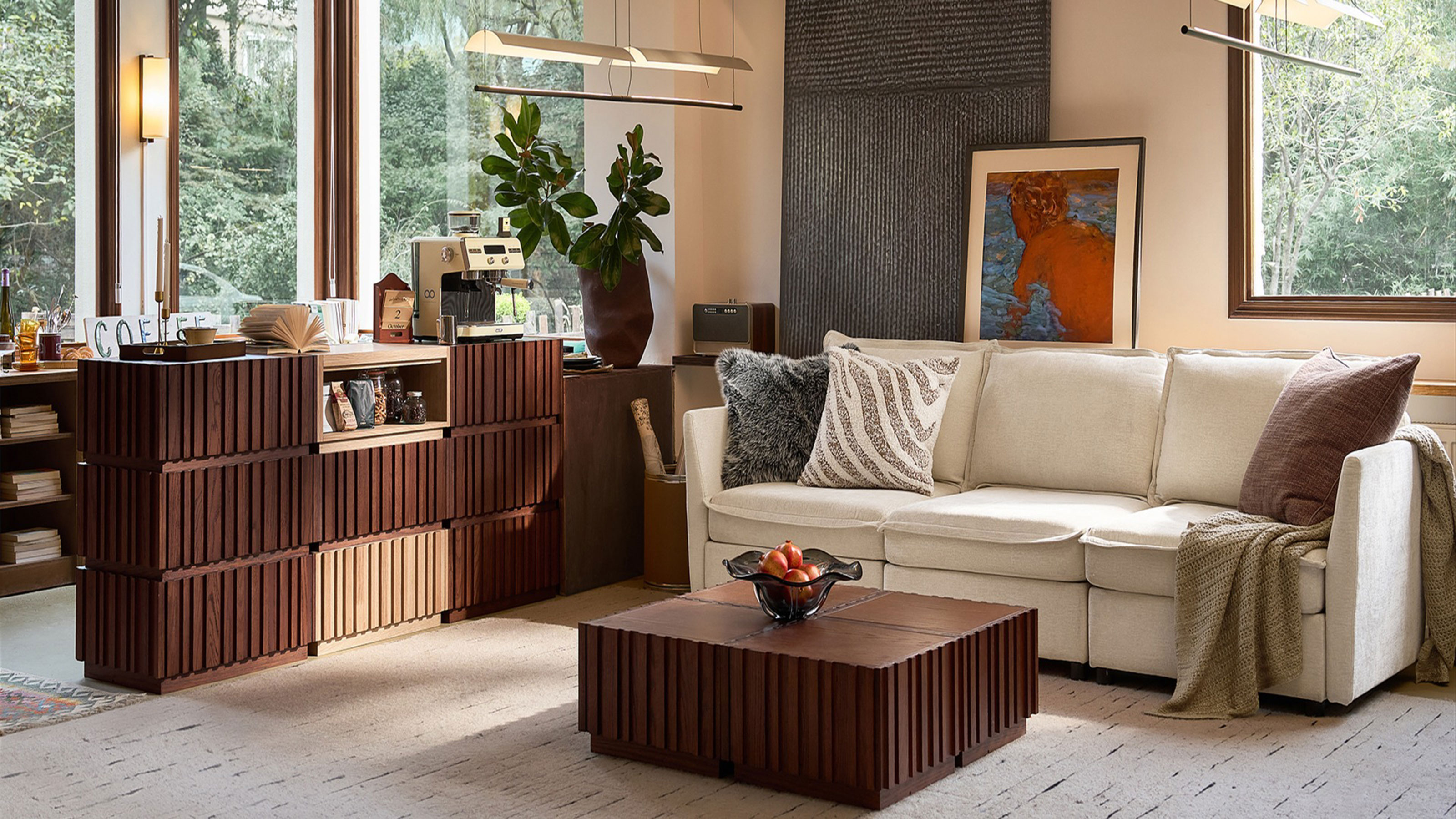 Living room with wooden coffee table, sideboard and white sofa