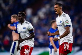 Hamburg's Robert Glatzel (right) celebrates after scoring against Schalke in July 2021.