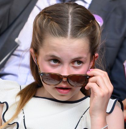 Princess Charlotte pulling her sunglasses down her nose
