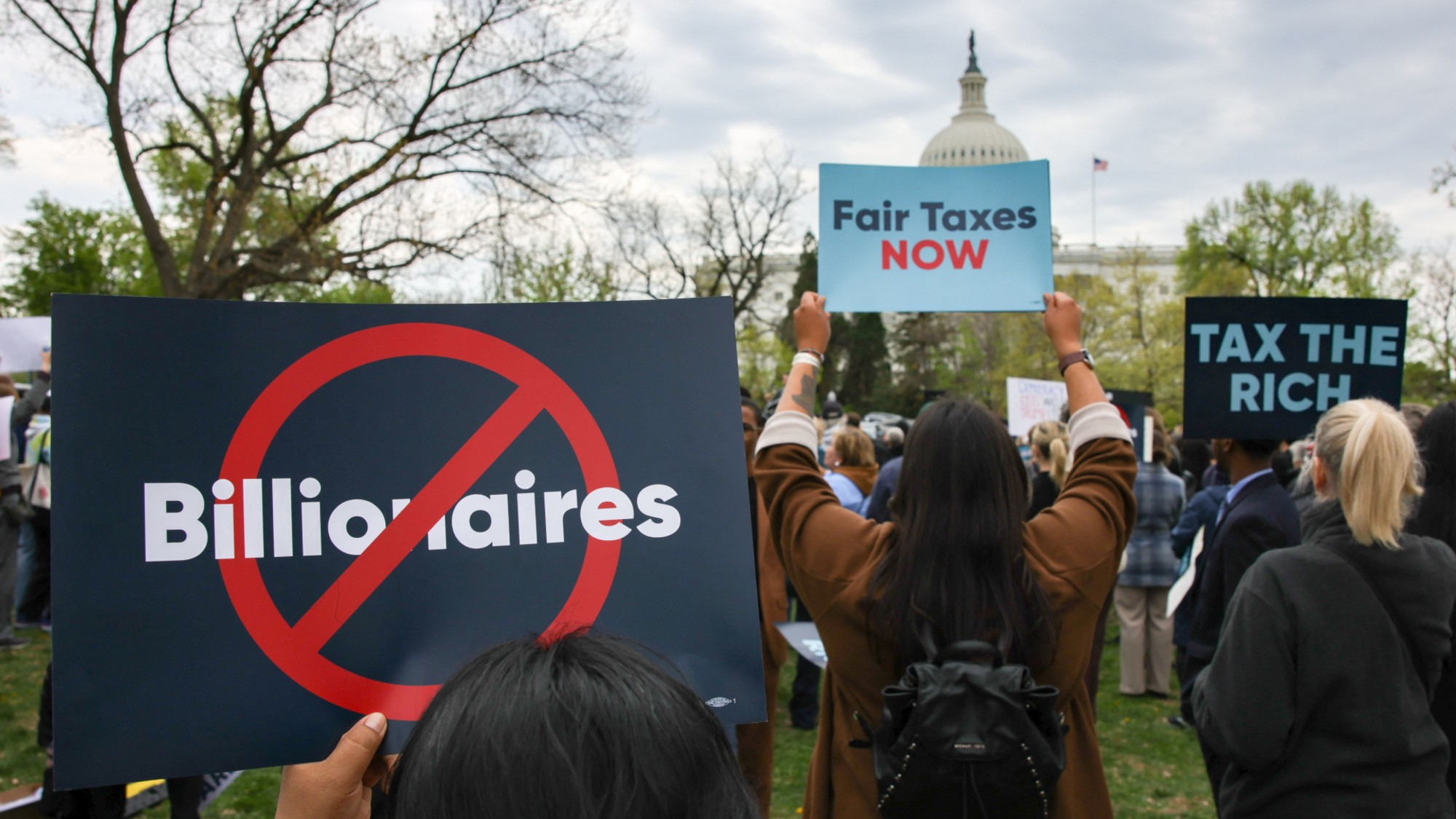 Protesters in Washington, D.C., rally in support of taxing the wealthy.