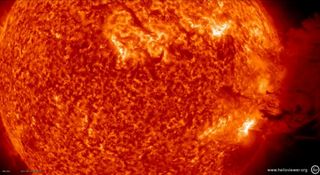 This still from a NASA and Helioviewer.org video shows the huge solar flare and coronal mass ejection (lower right) that erupted from the sun June 7, 2011, as seen by the Solar Dynamics Observatory.