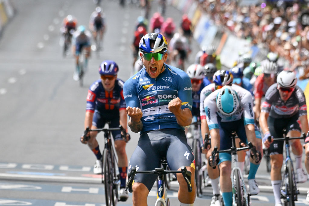 Red Bull-Bora-Hansgrohe rider Sam Welsford from Australia reacts after winning his third stage of the final of the Tour Down Under cycling race in Adelaide on January 26, 2025. (Photo by Brenton Edwards / AFP) / -- IMAGE RESTRICTED TO EDITORIAL USE - STRICTLY NO COMMERCIAL USE --