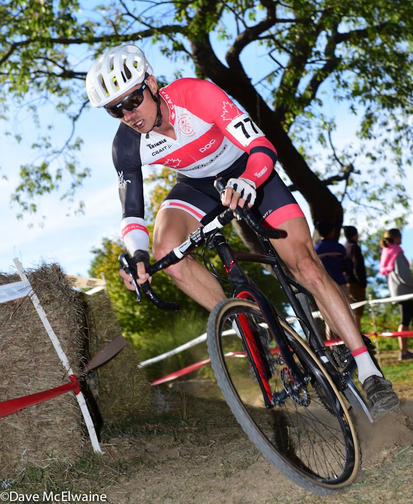 Michael Garrigan (Van Dessel) rounding a corner with two laps to go
