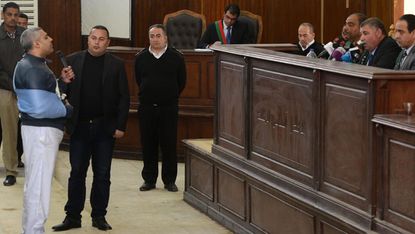  Al-Jazeera English journalist Egyptian-Canadian Mohamed Fahmy adresses the judge at the courtroom in Cairo 
