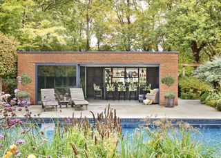pool house ideas: brick pool house and kitchen space
