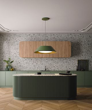 Rounded kitchen island, green with fluted finish, low hanging round pendant, round wooden wall cabinets