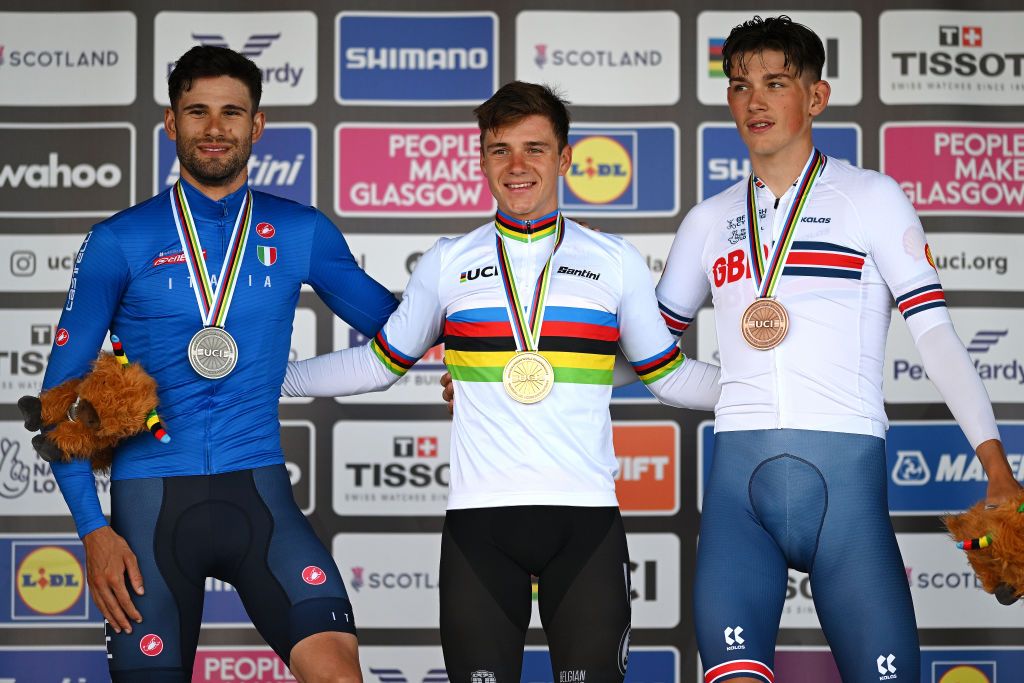 STIRLING SCOTLAND AUGUST 11 Silver medalist Filippo Ganna of Italy gold medalist Remco Evenepoel of Belgium and bronze medalist Joshua Tarling of The United Kingdom pose on the podium during the medal ceremony after the Men Elite Individual Time Trial a 478km race from Stirling to Stirling at the 96th UCI Cycling World Championships Glasgow 2023 Day 9 UCIWT on August 11 2023 in Stirling Scotland Photo by Dario BelingheriGetty Images