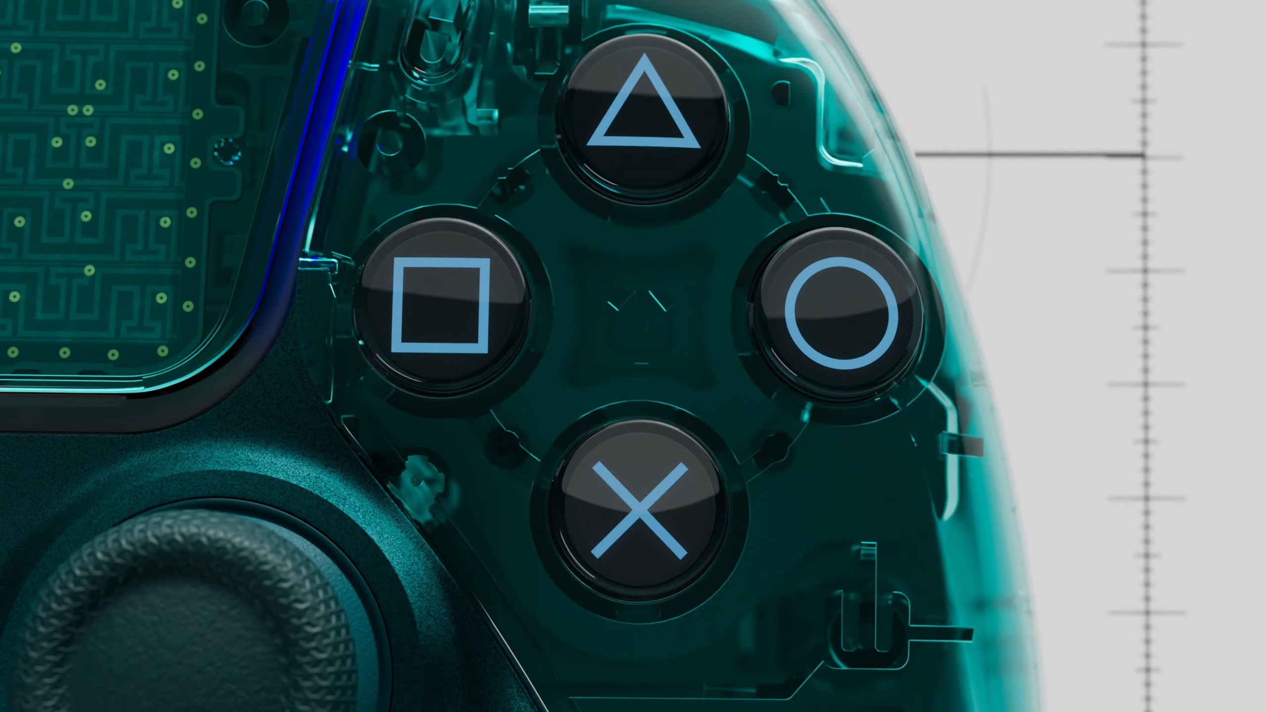The face buttons on the Emerald Green Prism DualSense