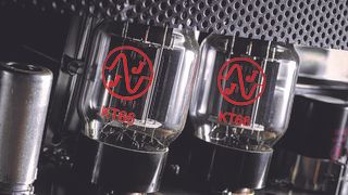 Close up of a pair of KT66 tubes in an amp