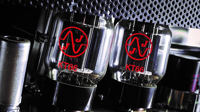 Close up of a pair of KT66 tubes in an amp