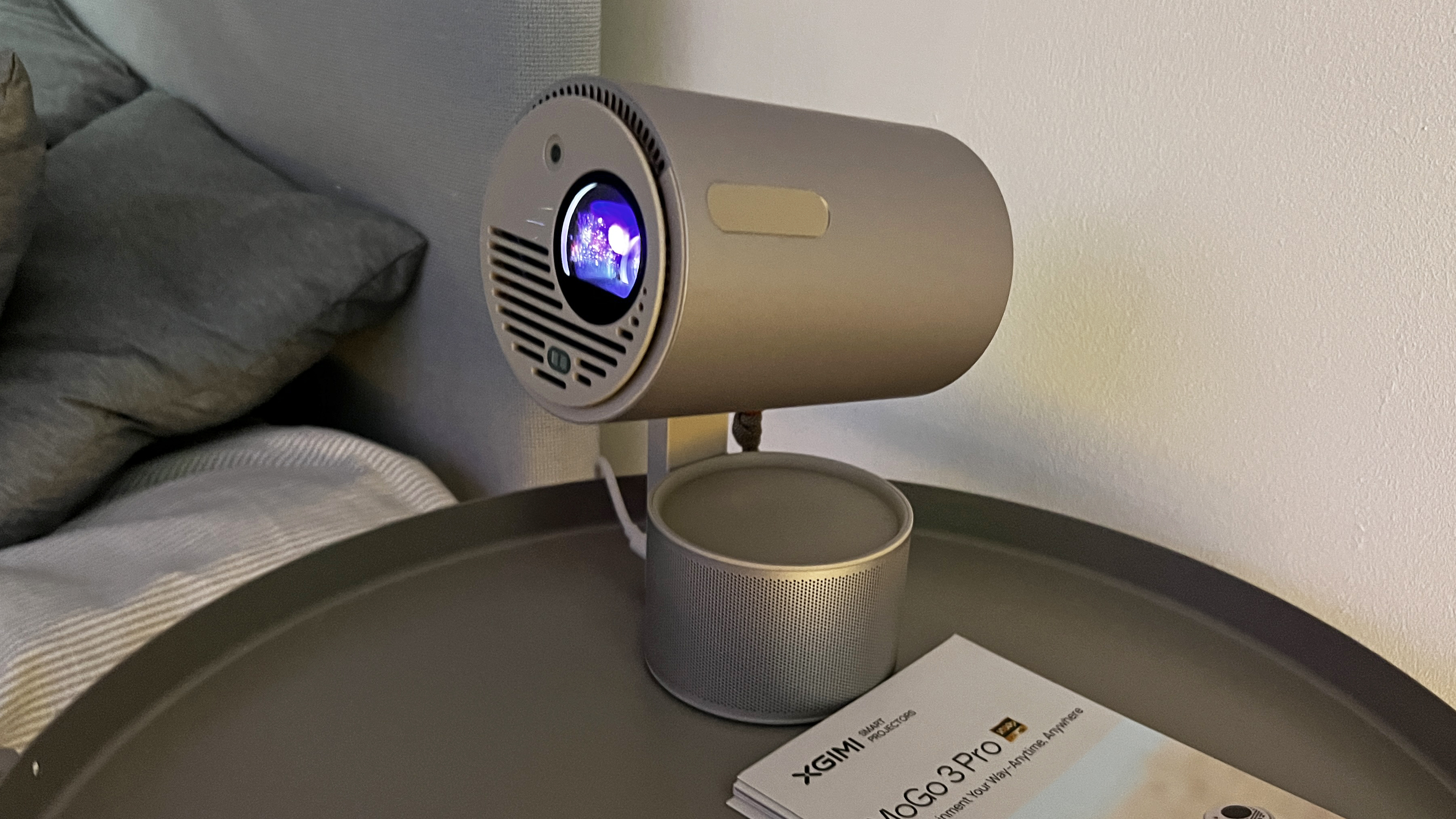 Xgimi Mogo 3 Pro on a bedside table