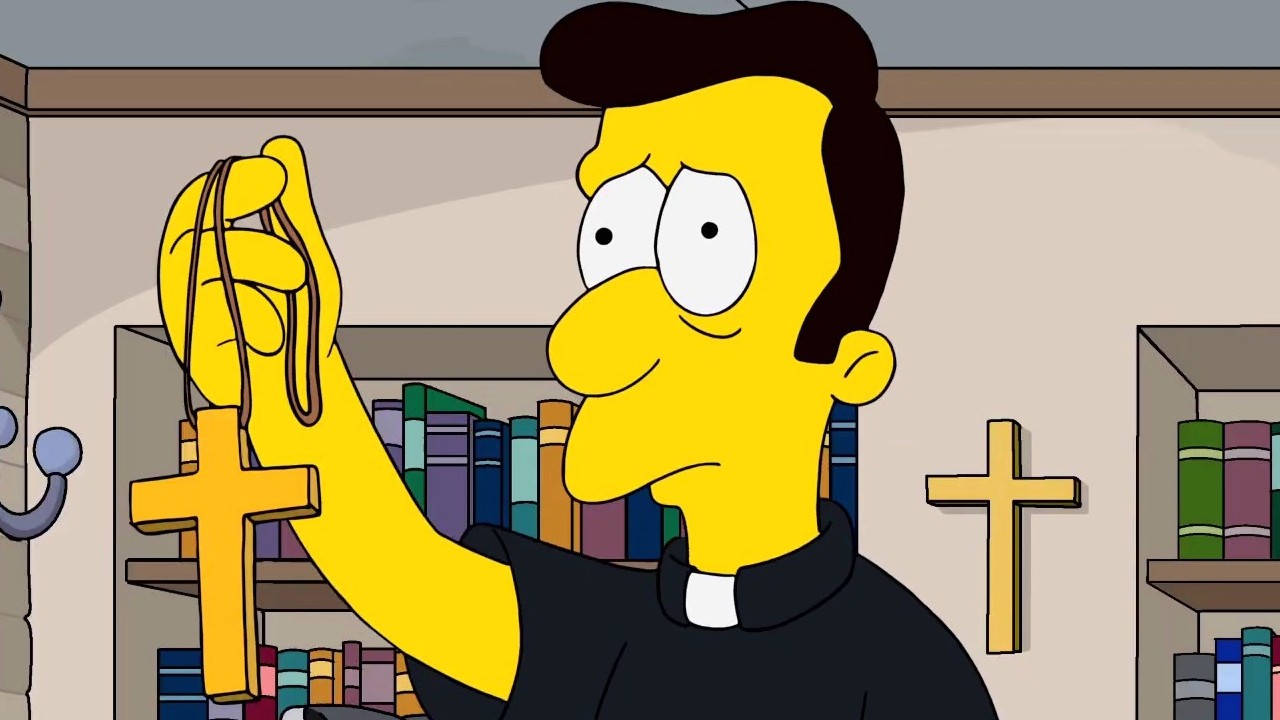 Reverend Lovejoy holding a cross
