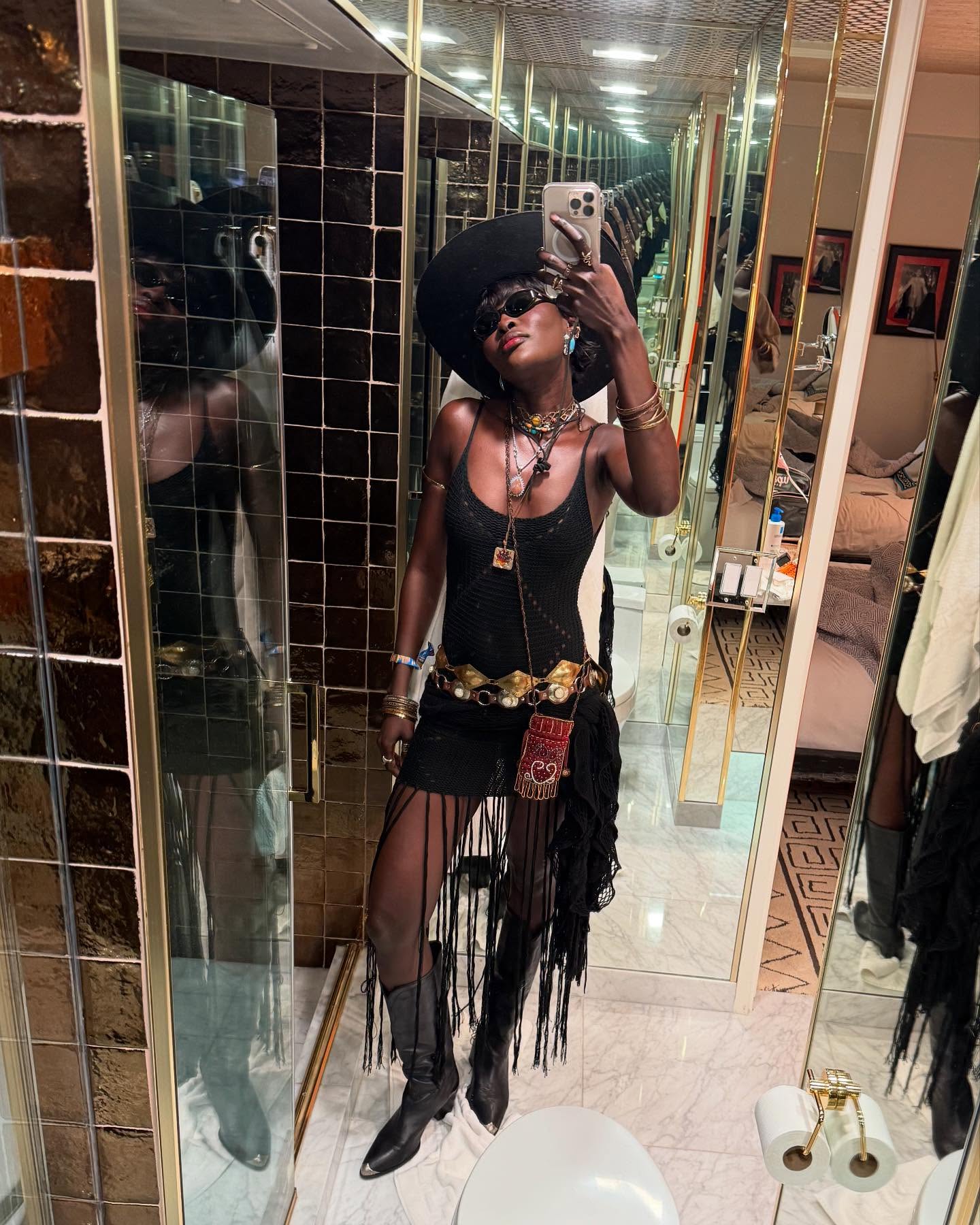 An image of @lefevrediary wearing a musical festival outfit.