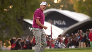 Ian Poulter reacts after winning his Saturday fourball match at Medinah