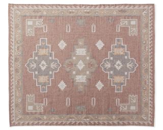 A kilim-style outdoor rug in terracotta tones from Arhauss