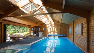 indoor swimming pool in wooden outbuilding