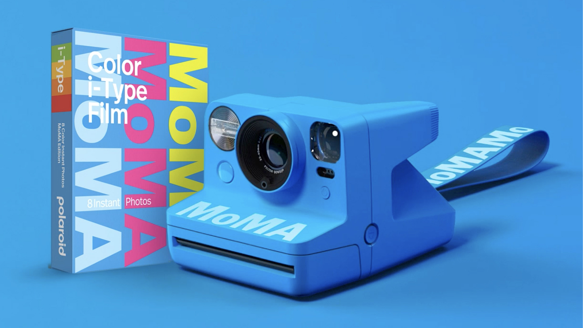 Polaroid Now Instant Camera Generation 3 - MoMa Edition camera against a blue background