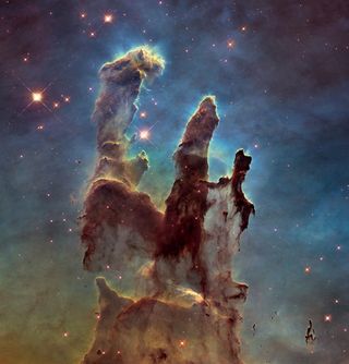 The Hubble Space Telescope has taken a fresh look at the iconic Pillars of Creation in the Eagle Nebula 6,500 light-years from Earth, revealing the most detailed view yet of a feature Hubble originally discovered 20 years ago. The new image was taken to commemorate Hubble's 25th anniversary in 2015.