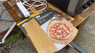 Ooni Volt 12 Electric Pizza Oven: bamboo peel and perforated peel accessories