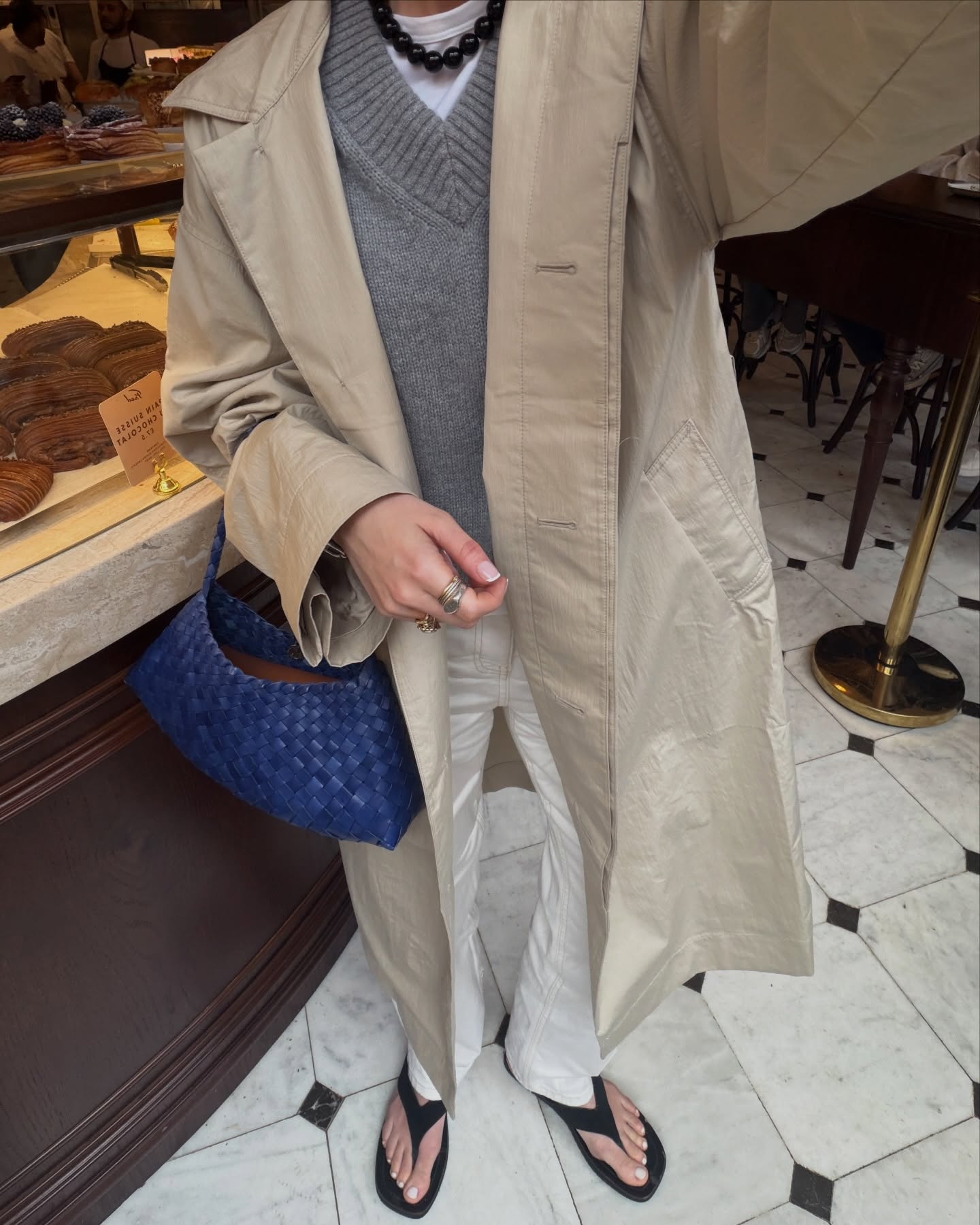 Alice Satterthwaite wears a white jeans outfit.