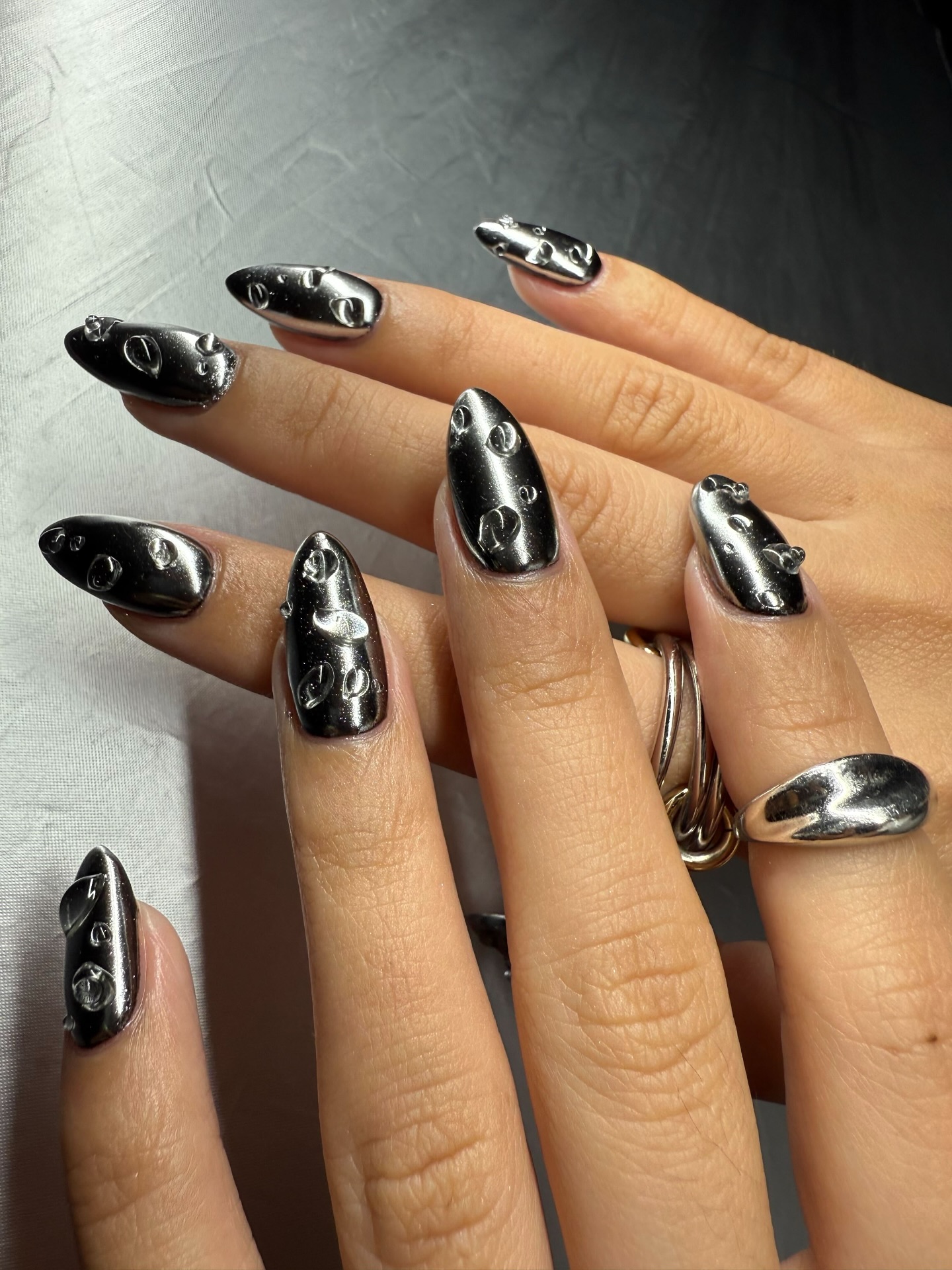 Paintbox nails black chrome manicure with water droplets