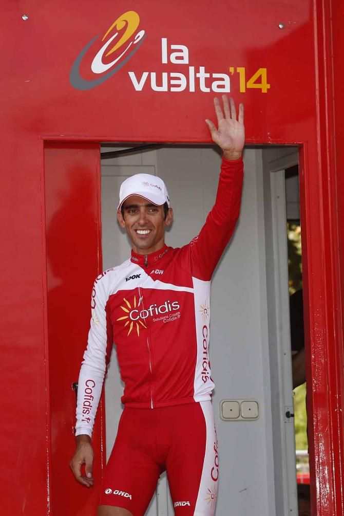 Daniel Navarro salutes the crowds from the podium.