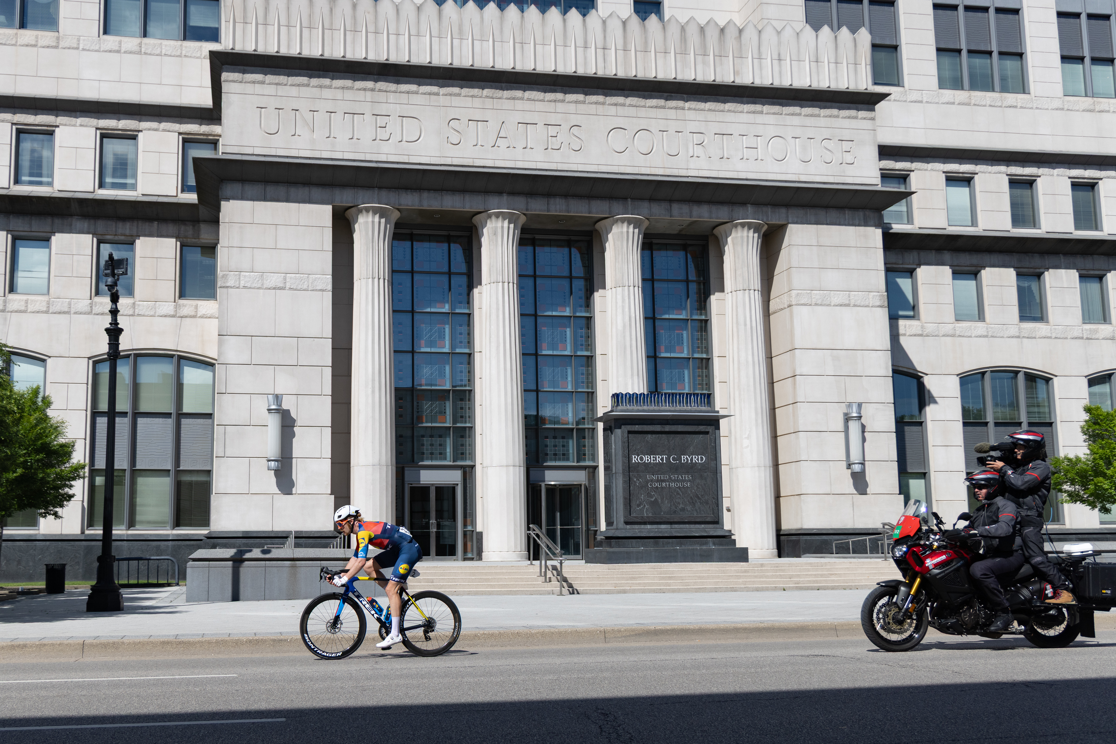 A solo Quinn Simmons passes the Robert C. Byrd courthouse having dropped his breakaway mates in spectacular fashion over the top of the Wertz Rd climb.