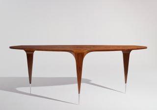 Table with three pointy legs by Jacqueline Terpins