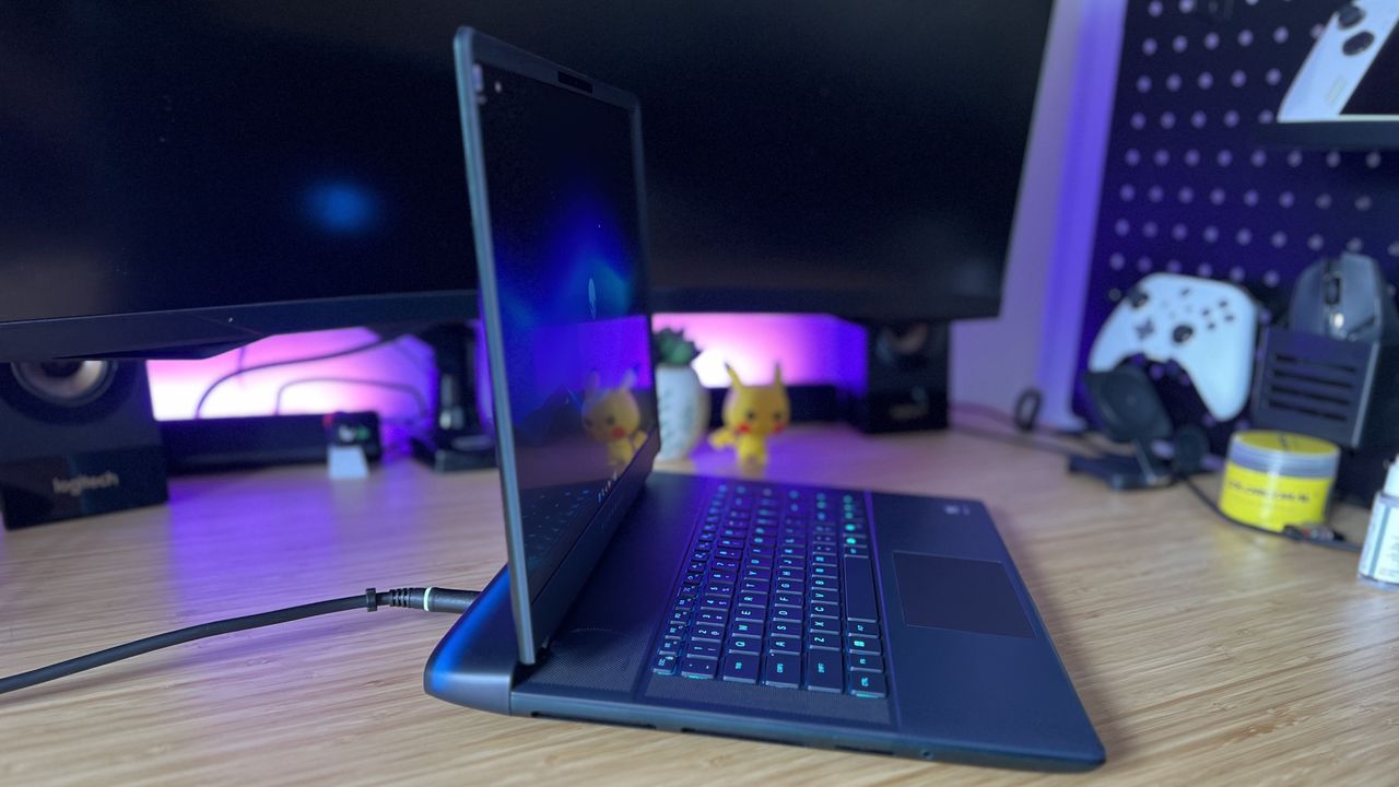 Side view of Alienware 16 Area-51 gaming laptop in a PC setup
