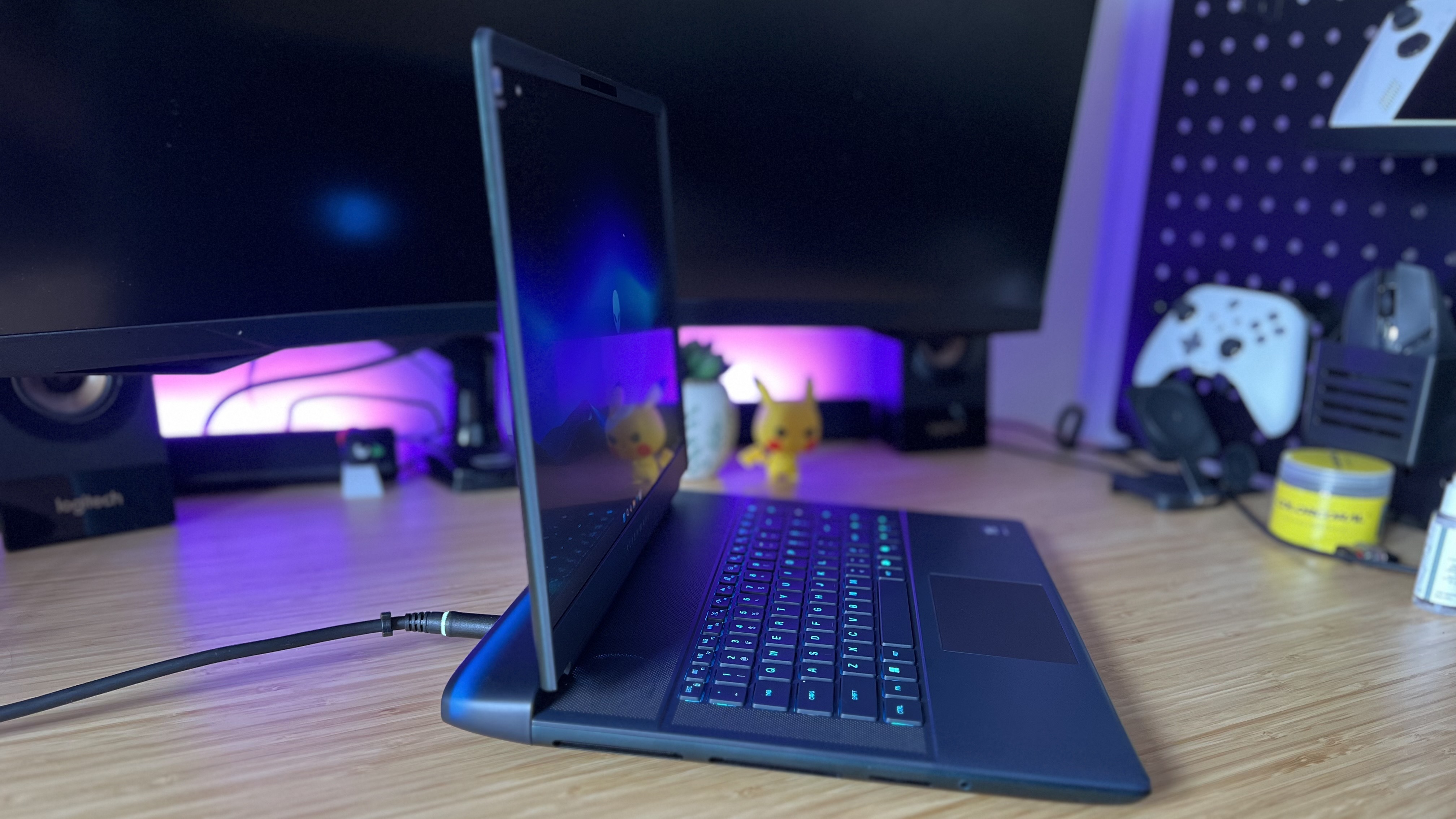 Side view of Alienware 16 Area-51 gaming laptop in a PC setup