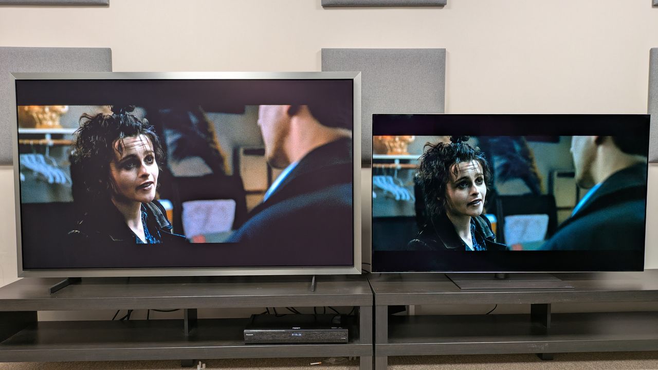Samsung S99H (left) vs LG G6 (right) showing Marla from Fight Club on screen. Both TVs are set to Movie Mode, the S99H is brighter while the G6 has stronger contrast