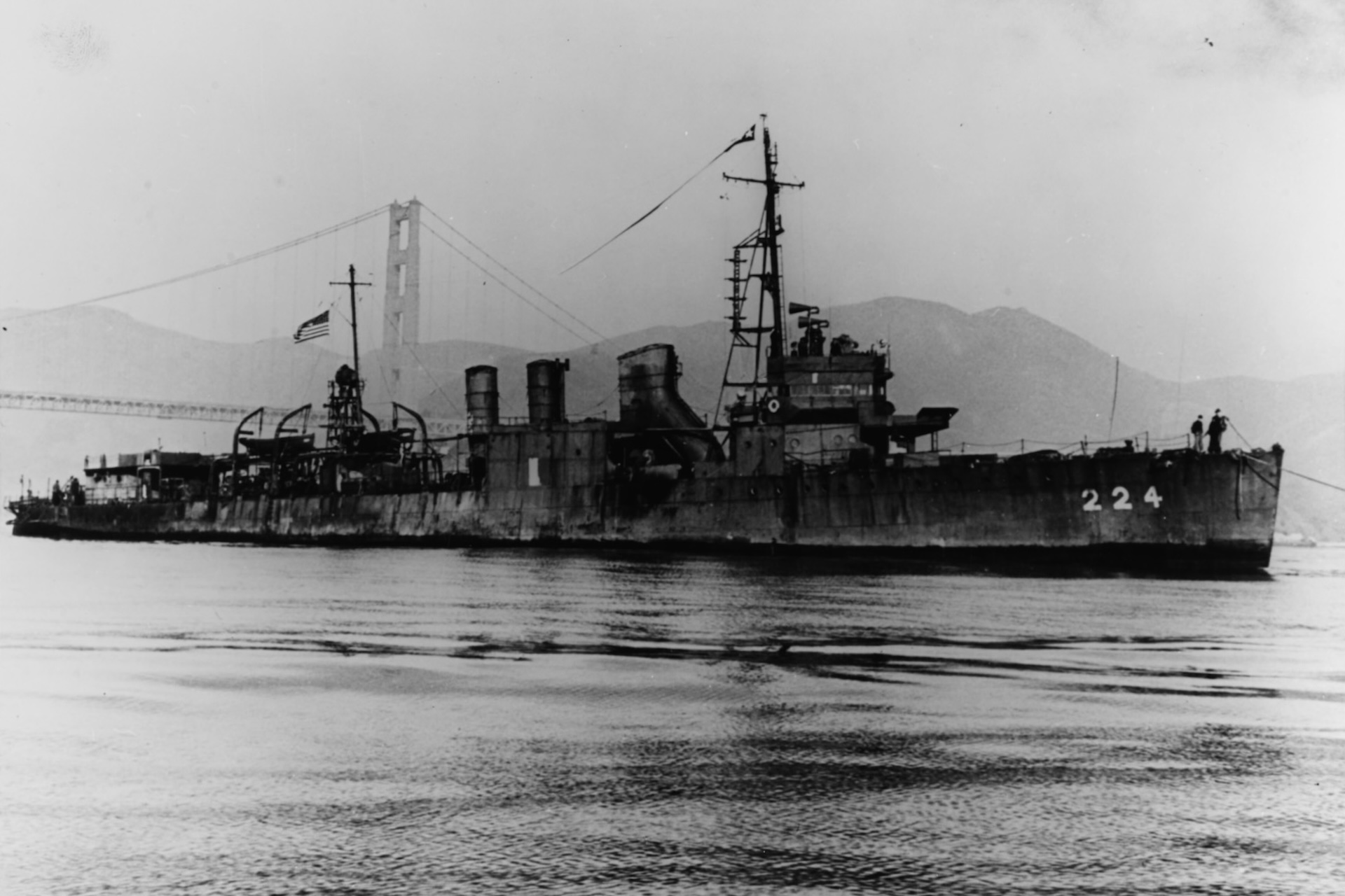 A black and white photo of a large war ship