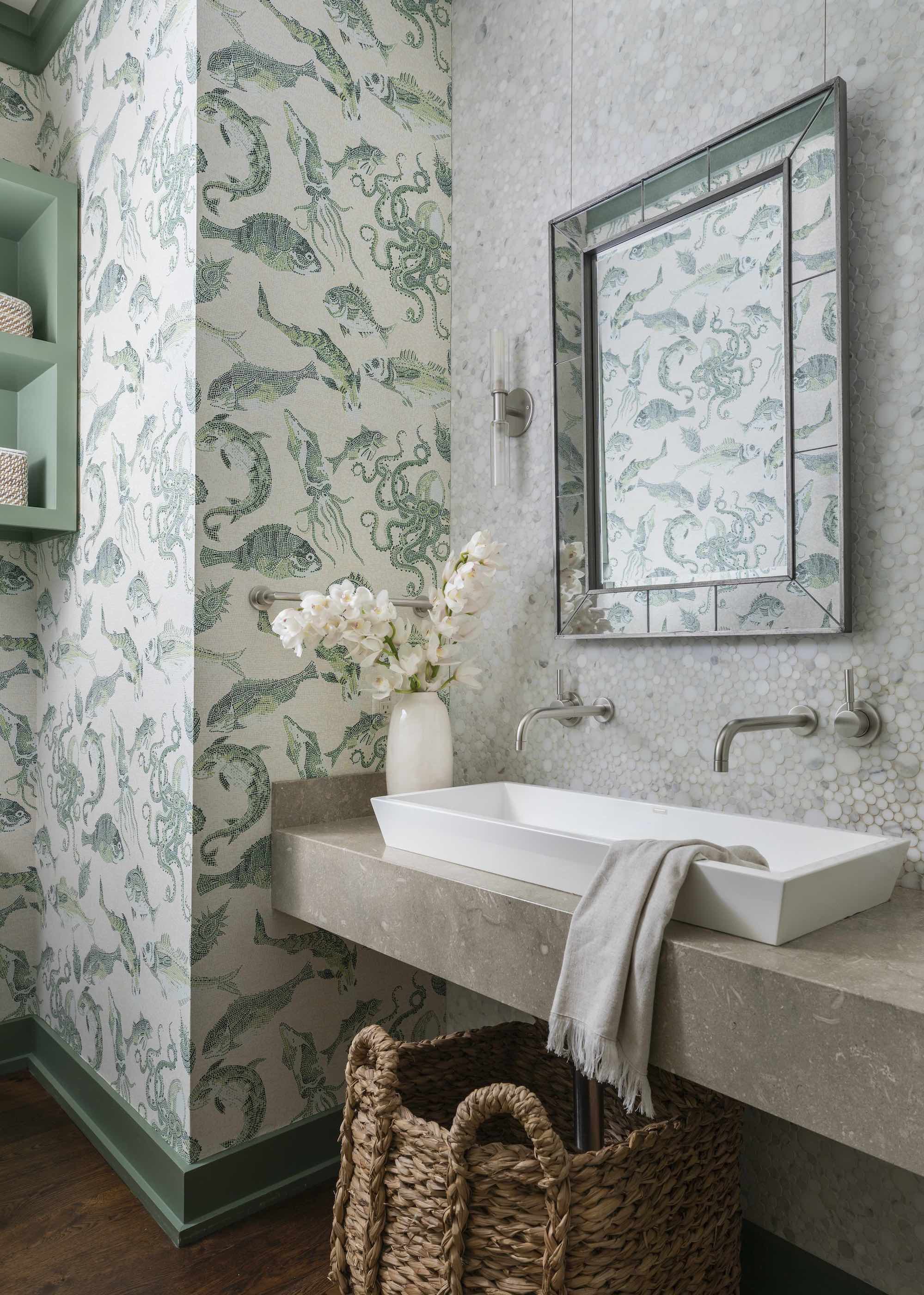 bathroom with fish wallpaper and large mirror