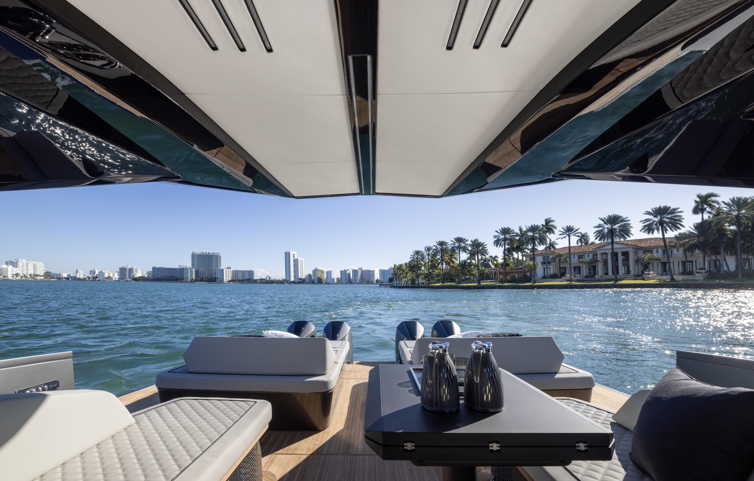 The covered seating area on the deck of the wallypower50x