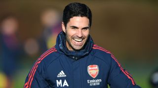 Arsenal manager Mikel Arteta laughs during a training session on 13 January, 2023.