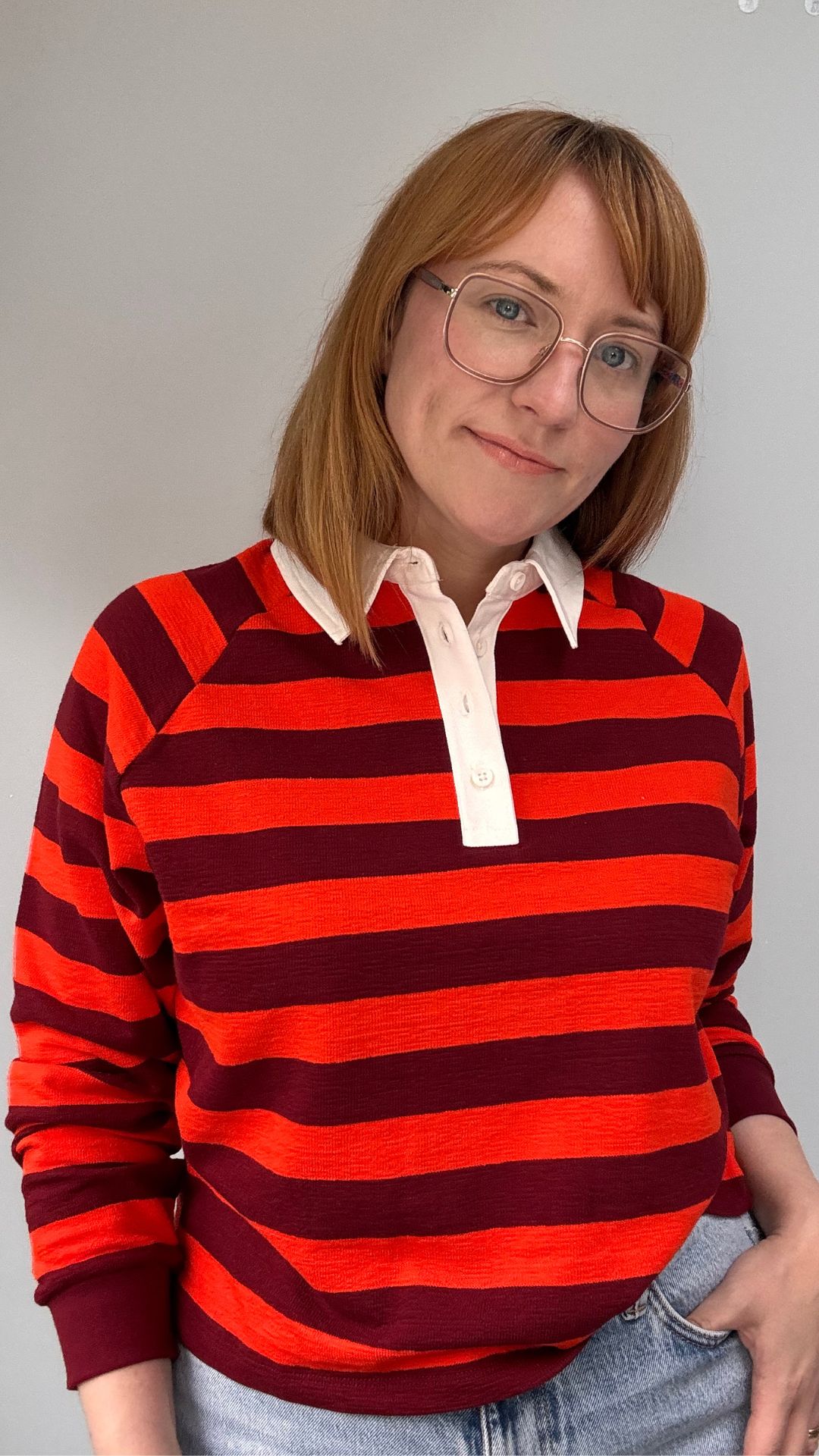 matilda wearing the next striped rugby top