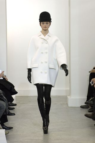 a model walks the Balenciaga runway in 2006