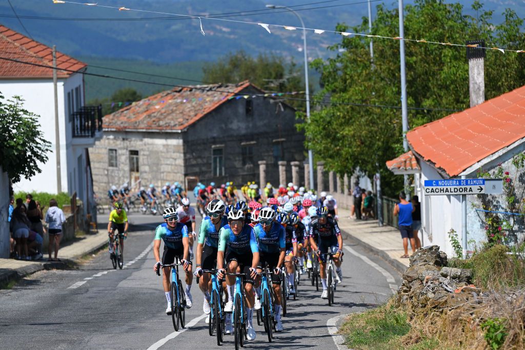 ESTACION DE MONTANA DE MANZANEDA OURENSE SPAIN AUGUST 29 LR Felix Gall of Austria Clement Berthet of France Sander De Pestel of Belgium and Geoffrey Bouchard of France and Team Decathlon AG2R La Mondiale lead the peloton during the La Vuelta 79th Tour of Spain 2024 Day 12 a 1375km stage from Ourense Termal to Estacion de Montana de Manzaneda 1491m UCIWT on August 29 2024 in Estacion de Montana de Manzaneda Spain Photo by Tim de WaeleGetty Images