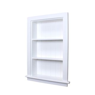 An angled white recessed wall shelf with two shelves in it