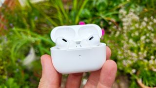 AirPods Pro 2 held in the hand