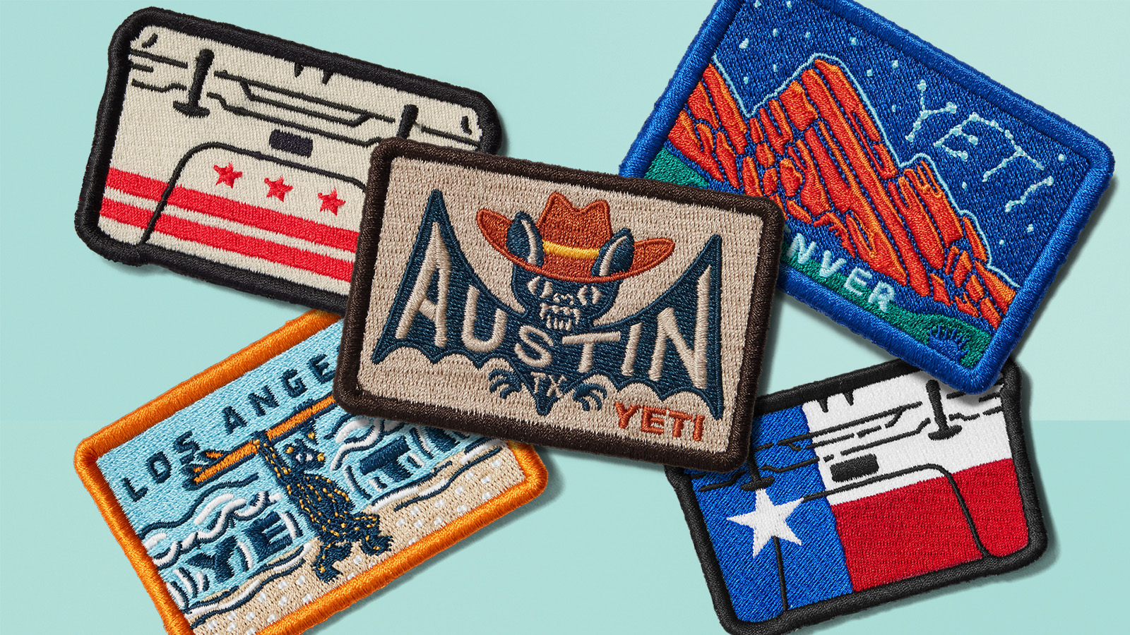 YETI saw-on patches on green background