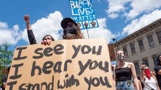 BLM protest, allies wearing face masks, carrying handmade signs