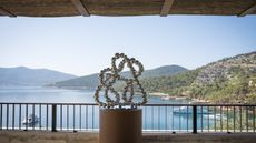 Sculpture at Bodrum Loft / Perrotin exhibition, with view of sea