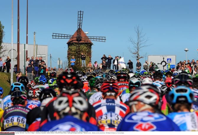 Rider approach one of the windmills during stage 1