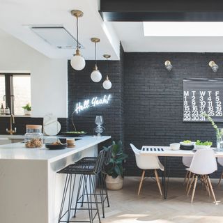 kitchen with dark wall and dining table