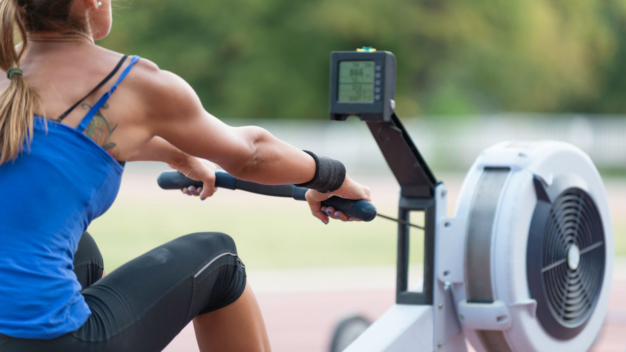 A woman exercising on the Concept2 RowErg machine