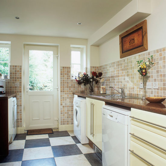 utility room with black and white tiles