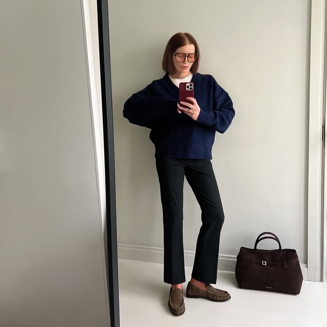 Belle wears a spring outfit with loafers.