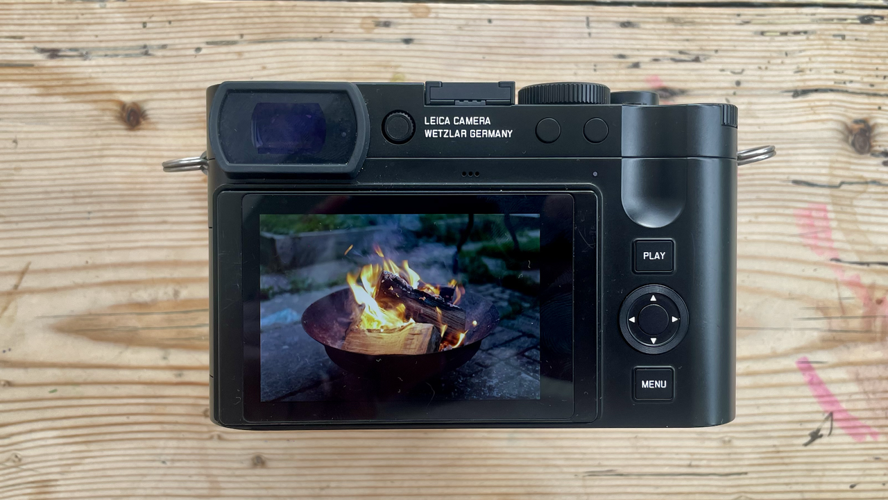 Leica Q3 43 camera on a wooden table