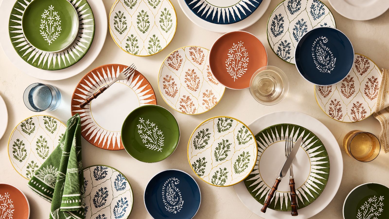 Table set with Peter Dunham&#039;s new pieces for Hudson Grace in layered prints and colors for fall